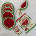 Handcrafted crochet watermelon coaster and matching keychain in red, green, white, and black cotton yarn with classic watermelon slice design